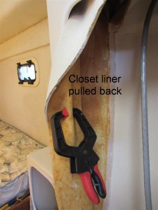 closet wall liner pulled back for wire installation